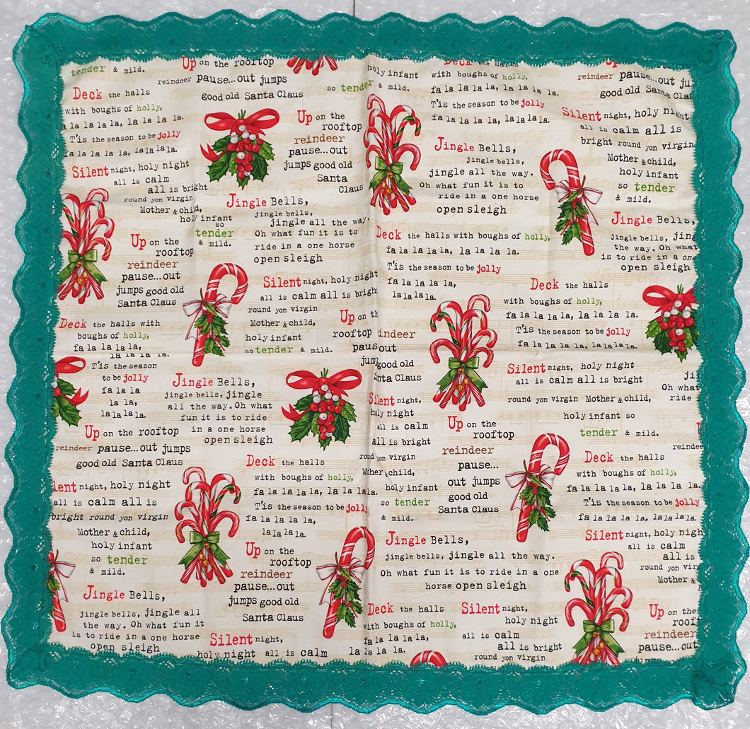 Lovely Christmas ivory tablecloth with written text of a few Carols - handmade